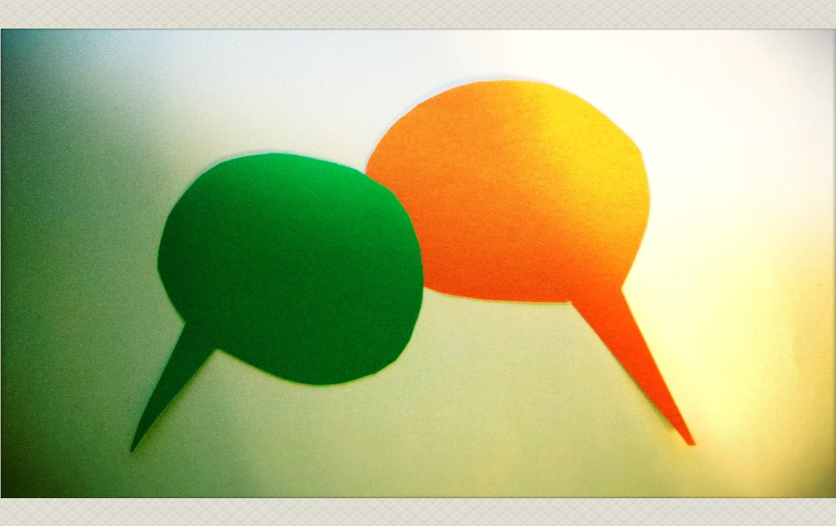 Intercultural Communication, text balloons in green and orange